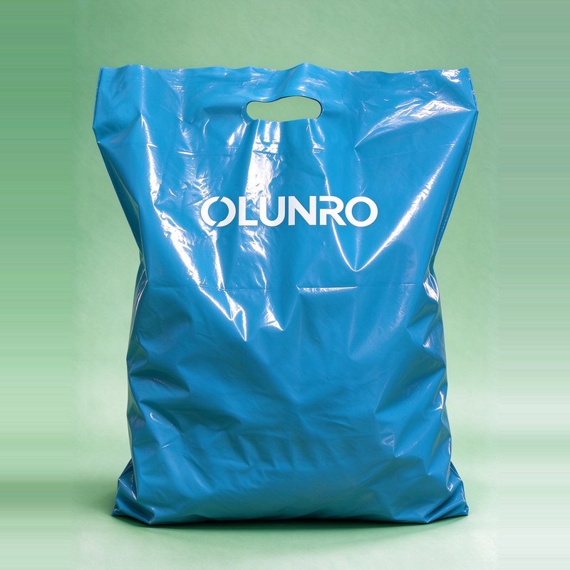 PCR PE Films & Bags | GRS Certified Recycled Packaging Die-cut Handle Bag - Blue — Retail · France
